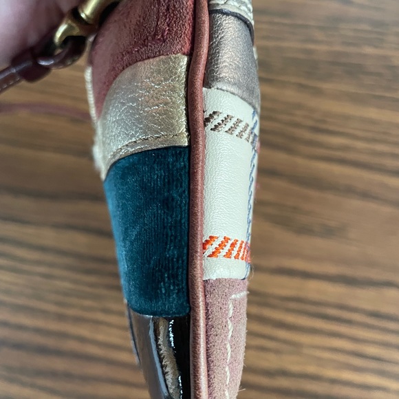 Pre-owned Coach Multi-pattern wristlet. - Picture 6 of 7